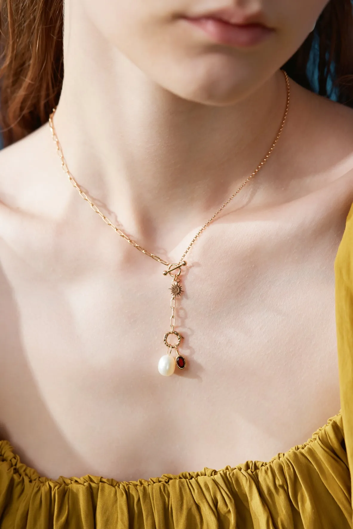 Oval Garnet Gold Pendant