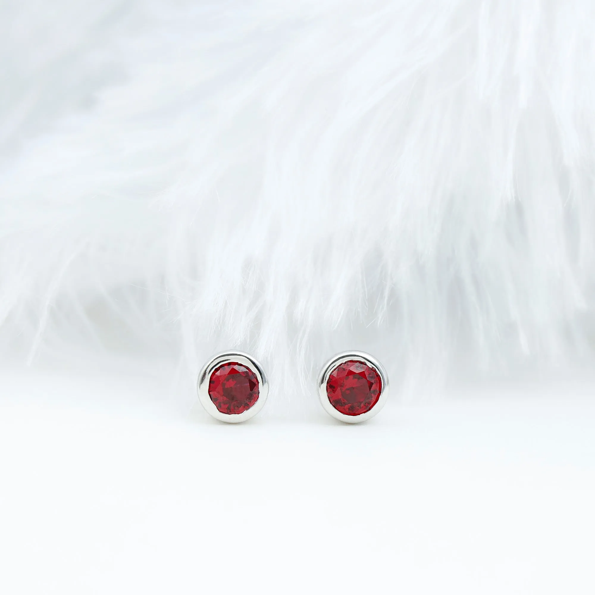 Round Shape lab Grown Ruby Solitaire Stud Earrings in Bezel Setting