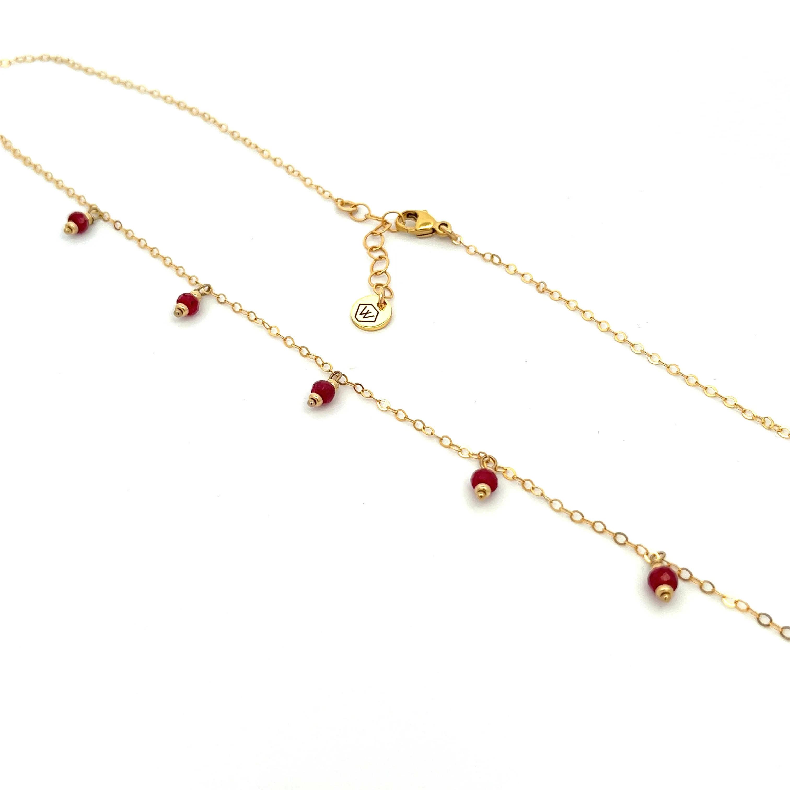 silk road - ruby dangle charm necklace