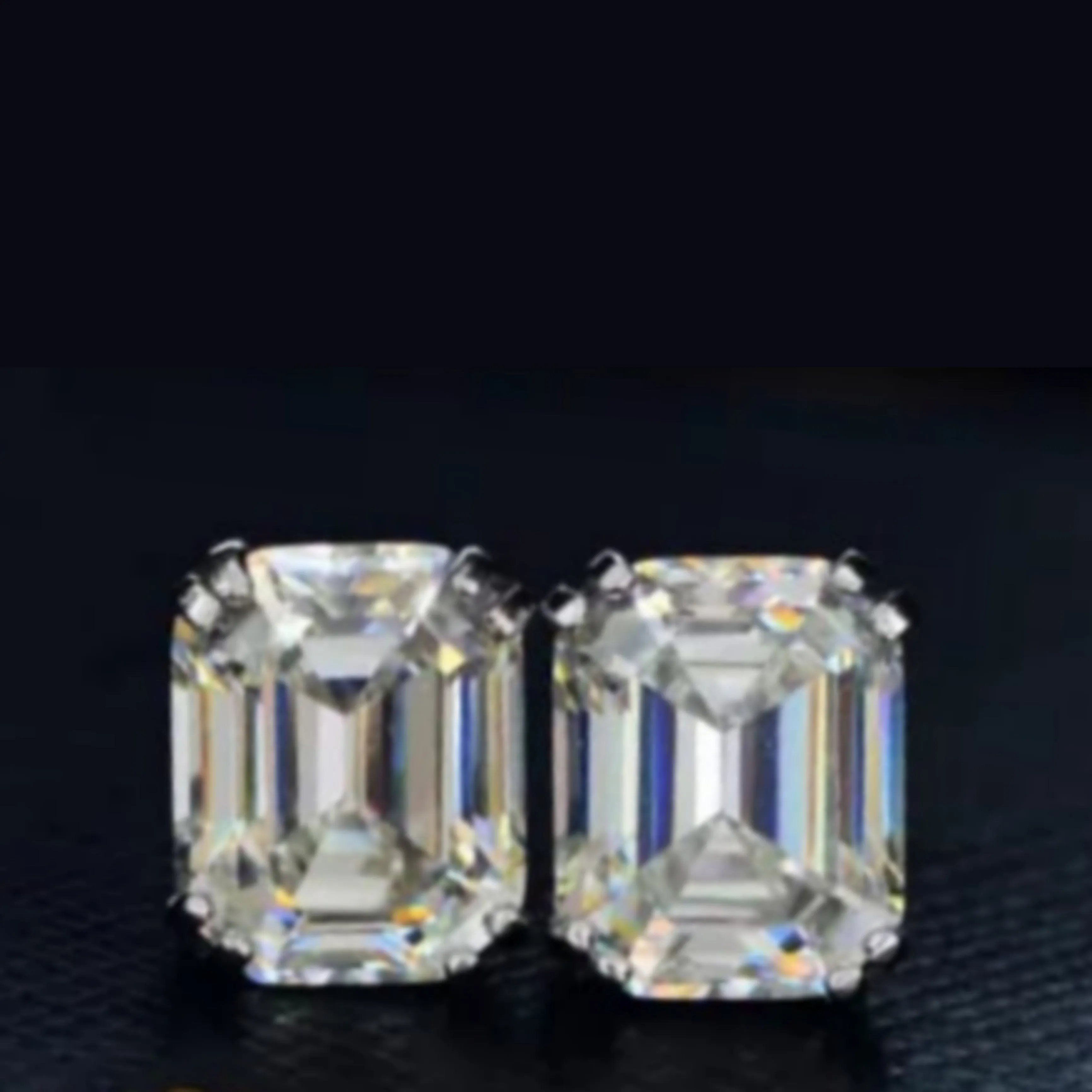 Sterling Silver CZ Emerald Cut Solitaire Stud Earrings
