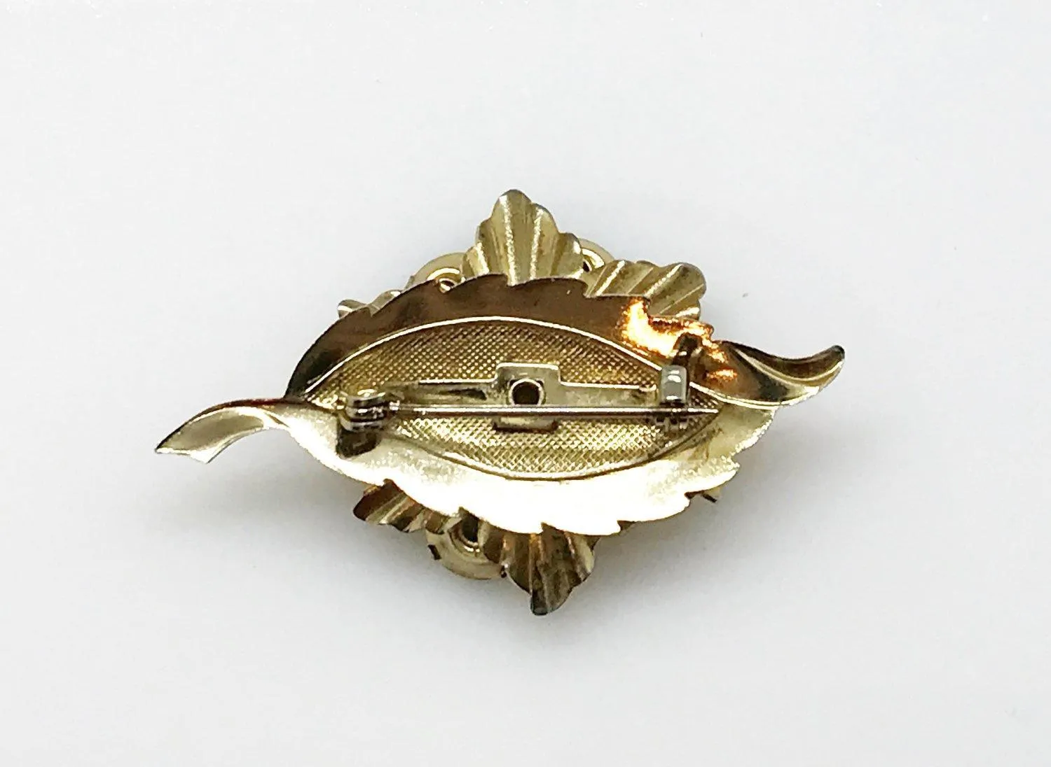 Vintage Spinning Brooch with Vibrant Purple Stones
